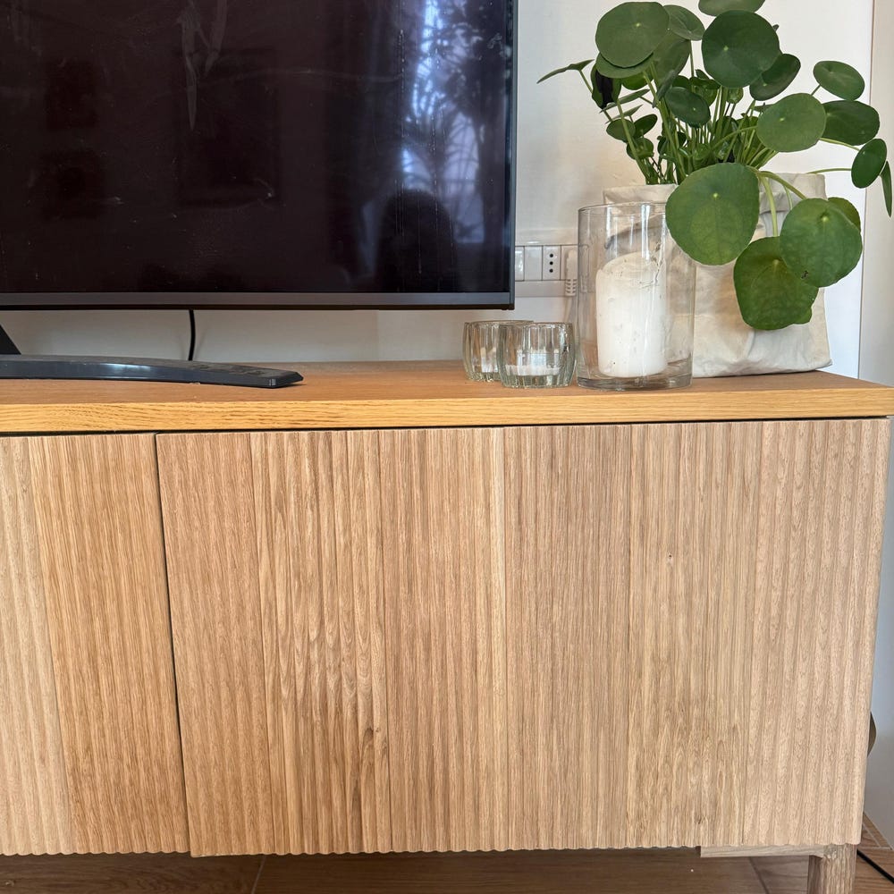 Smoked oak fluted panels fitted to a TV cabinet